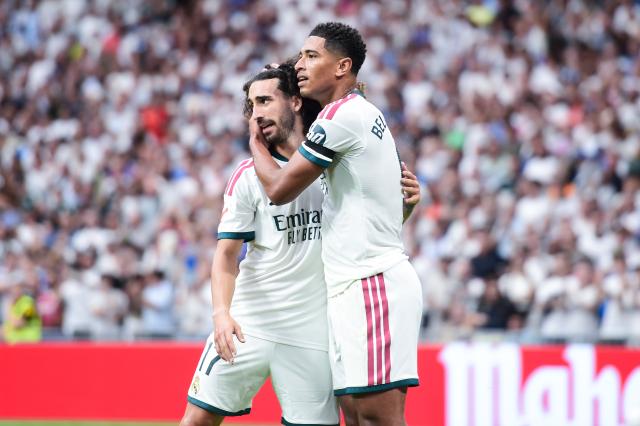 (260831) -- MADRID, Aug. 31, 2026 (Xinhua) -- Real Madrid's Jude Bellingham (R) celebrates his score with teammate Marc Cucurella during a La Liga football match between Real Madrid and Malaga CF at Santiago Bernabeu stadium in Madrid, Spain, on Aug. 30, 2026. (Photo by Gustavo Valiente/Xinhua)