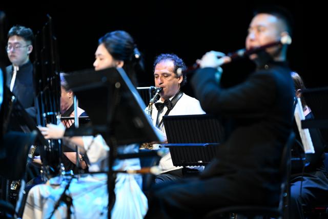 (260831) -- GENEVA, Aug. 31, 2026 (Xinhua) -- Musicians perform at the Chinese folk music concert "A Panorama of Hunan" in Geneva, Switzerland, Aug. 30, 2026. The Chinese folk music concert "A Panorama of Hunan" made its debut on its five-country European tour here on Sunday. (Xinhua/Lian Yi)