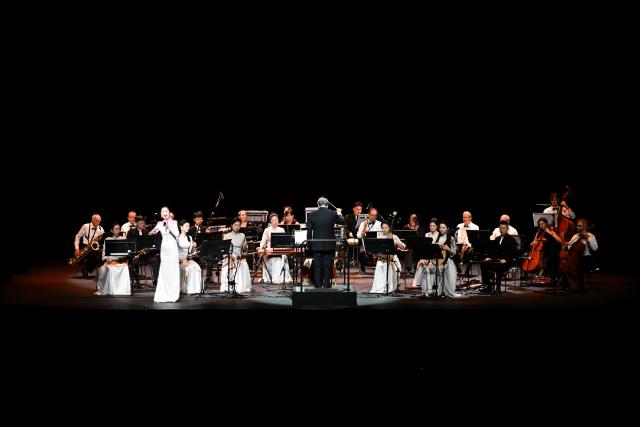 (260831) -- GENEVA, Aug. 31, 2026 (Xinhua) -- Musicians perform at the Chinese folk music concert "A Panorama of Hunan" in Geneva, Switzerland, Aug. 30, 2026. The Chinese folk music concert "A Panorama of Hunan" made its debut on its five-country European tour here on Sunday. (Xinhua/Lian Yi)