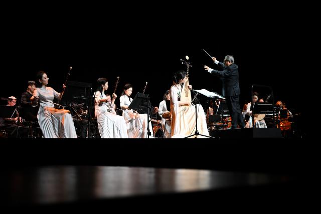 (260831) -- GENEVA, Aug. 31, 2026 (Xinhua) -- Musicians perform at the Chinese folk music concert "A Panorama of Hunan" in Geneva, Switzerland, Aug. 30, 2026. The Chinese folk music concert "A Panorama of Hunan" made its debut on its five-country European tour here on Sunday. (Xinhua/Lian Yi)