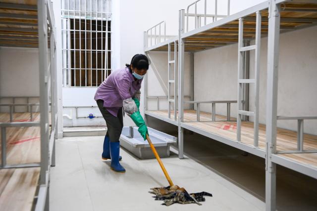 (260831) -- HENGZHOU, Aug. 31, 2026 (Xinhua) -- A staff member cleans a dormitory at a secondary school in Yunbiao Town of Hengzhou, south China's Guangxi Zhuang Autonomous Region, Aug. 30, 2026. A new semester kicked off for primary and secondary schools in Hengzhou on Monday. 
   Hengzhou suffered severe flooding triggered by Typhoon Maysak in July this year. After cleanup, repair, and disinfection, all the flood-affected schools started the new semester. (Xinhua/Cao Yiming)