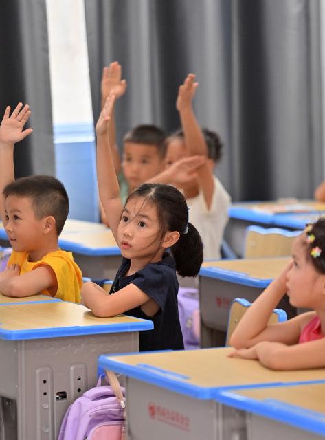 (260831) -- HENGZHOU, Aug. 31, 2026 (Xinhua) -- Students attend a class on the first day of the new semester at a school in Yunbiao Town of Hengzhou, south China's Guangxi Zhuang Autonomous Region, Aug. 31, 2026. A new semester kicked off for primary and secondary schools in Hengzhou on Monday. 
   Hengzhou suffered severe flooding triggered by Typhoon Maysak in July this year. After cleanup, repair, and disinfection, all the flood-affected schools started the new semester. (Xinhua/Huang Xiaobang)