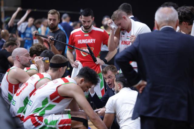 (260831) -- LJUBLJANA, Aug. 31, 2026 (Xinhua) -- Gasper Okorn (front C), coach of Hungary, instructs the players during the men's FIBA Basketball World Cup 2027 European Qualifiers match between Slovenia and Hungary at Tivoli Sports Hall in Ljubljana, Slovenia, Aug. 30, 2026. (Photo by Zeljko Stevanic/Xinhua)
