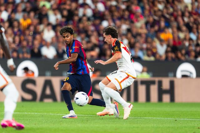 (260901) -- BARCELONA, Sept. 1, 2026 (Xinhua) -- Barcelona's Lamine Yamal (L) competes during the La Liga football match between FC Barcelona and Rayo Vallecano in Barcelona, Spain, on Aug. 31, 2026. (Photo by Joan Gosa/Xinhua)