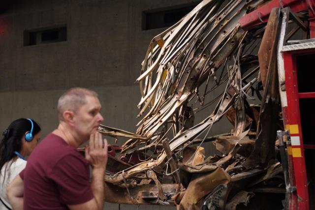 (260901) -- NEW YORK, Sept. 1, 2026 (Xinhua) -- People view an exhibit at the National September 11 Memorial & Museum in New York, the United States, on Aug. 31, 2026. A preview of an exhibition marking the 25th anniversary of the 9/11 attacks was held here on Monday. (Xinhua/Zhang Fengguo)