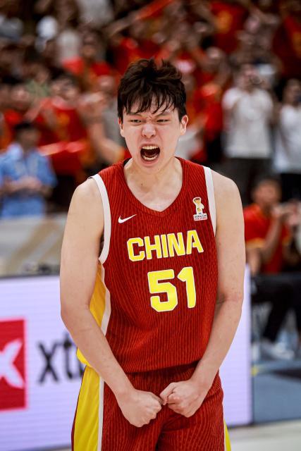 (260901) -- ZHUJI, Sept. 1, 2026 (Xinhua) -- Yang Hansen of China celebrates after scoring at the end of the Second Round Group F match between China and Lebanon at the 2027 FIBA Basketball World Cup Asian Qualifiers in Zhuji, east China's Zhejiang Province, Aug. 31, 2026. (Photo by Zhou Shengrong/Xinhua)
