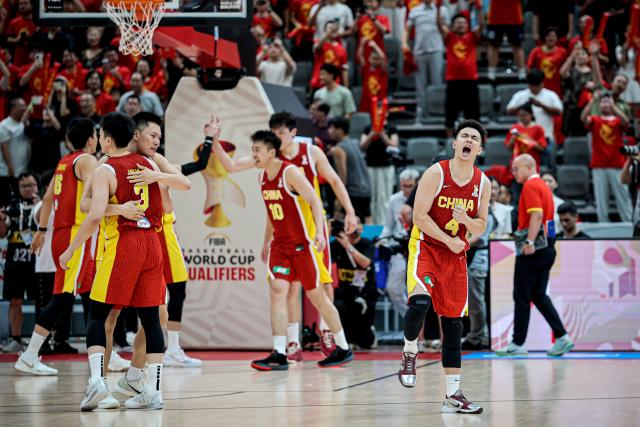 (260901) -- ZHUJI, Sept. 1, 2026 (Xinhua) -- Zhao Jiwei (front R) of China celebrates after winning the Second Round Group F match between China and Lebanon at the 2027 FIBA Basketball World Cup Asian Qualifiers in Zhuji, east China's Zhejiang Province, Aug. 31, 2026. (Photo by Jiang Liben/Xinhua)