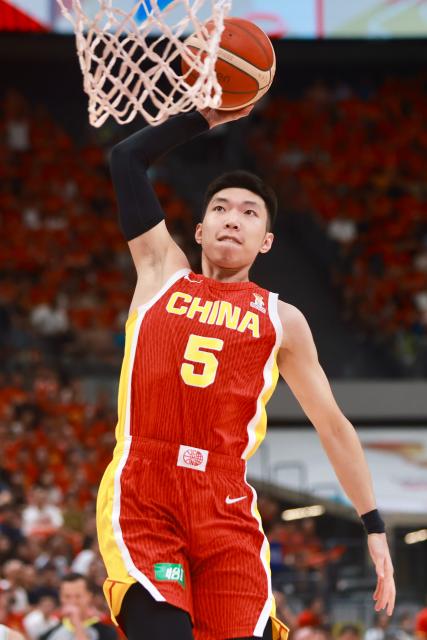 (260901) -- ZHUJI, Sept. 1, 2026 (Xinhua) -- Liao Sanning of China dunks during the Second Round Group F match between China and Lebanon at the 2027 FIBA Basketball World Cup Asian Qualifiers in Zhuji, east China's Zhejiang Province, Aug. 31, 2026. (Photo by Zhou Shengrong/Xinhua)