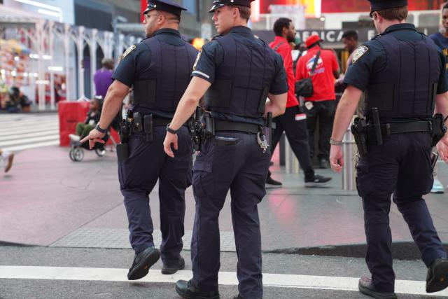 (260901) -- NEW YORK, Sept. 1, 2026 (Xinhua) -- Police work at the site of a stabbing attack in New York City, the United States, on Aug. 31, 2026. A woman stabbed two people with a knife near New York City's Times Square Monday afternoon before she was shot by police, local media reported. (Xinhua/Zhang Fengguo)