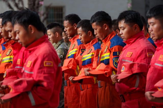 (260901) -- GYIRONG, Sept. 1, 2026 (Xinhua) -- A memorial service for the victims of the Aug. 26 mudslide is held at the Gyirong Port Branch of the Xigaze Public Security Bureau in Gyirong County, southwest China's Xizang Autonomous Region, Sept. 1, 2026. Memorial services were held on Tuesday morning in Gyirong County, southwest China's Xizang Autonomous Region, to mourn the victims of the Aug. 26 mudslide that caused heavy casualties and left many missing. (Xinhua/Tenzin Nyida)