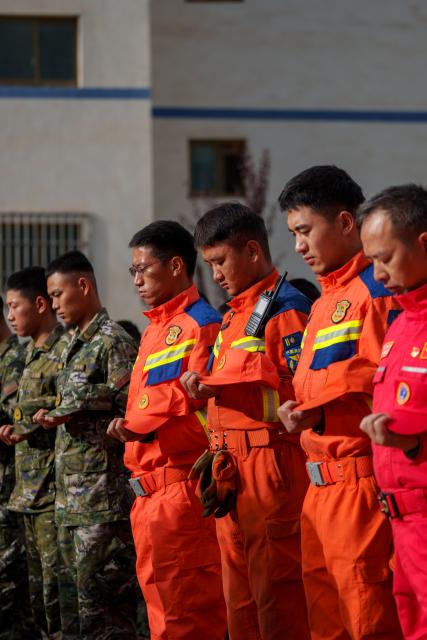 (260901) -- GYIRONG, Sept. 1, 2026 (Xinhua) -- A memorial service for the victims of the Aug. 26 mudslide is held at the Gyirong Port Branch of the Xigaze Public Security Bureau in Gyirong County, southwest China's Xizang Autonomous Region, Sept. 1, 2026. Memorial services were held on Tuesday morning in Gyirong County, southwest China's Xizang Autonomous Region, to mourn the victims of the Aug. 26 mudslide that caused heavy casualties and left many missing. (Xinhua/Tenzin Nyida)