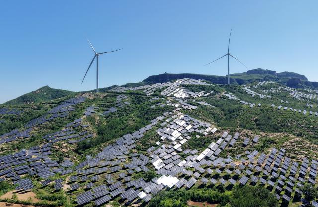 (260901) -- BEIJING, Sept. 1, 2026 (Xinhua) -- An aerial drone photo taken on May 30, 2026 shows a wind-photovoltaic power project in Yuantou Town of Zanhuang County, north China's Hebei Province. China's installed photovoltaic (PV) power capacity surpassed coal-fired power capacity for the first time, making PV the country's largest power source by installed capacity, the National Energy Administration said Tuesday.
  China's installed PV power capacity reached 1.286 billion kilowatts at the end of July, according to the administration. (Xinhua/Yang Shiyao)