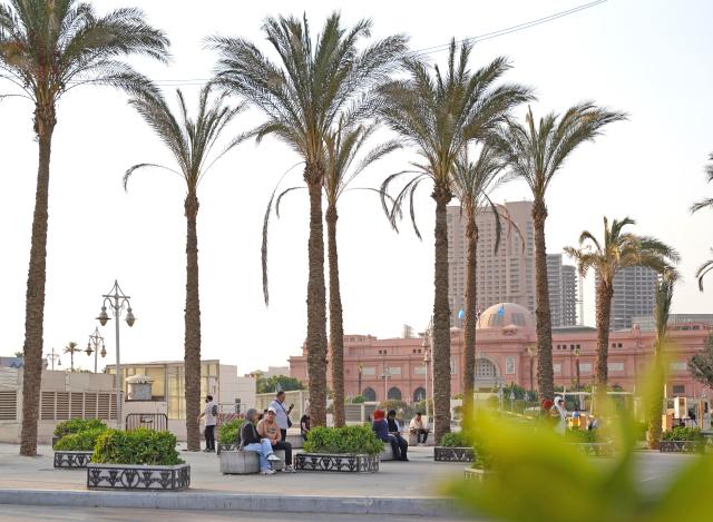 (260901) -- CAIRO, Sept. 1, 2026 (Xinhua) -- People relax at Tahrir Square in Cairo, Egypt, Aug. 30, 2026. Egypt is home to an ancient civilization that flourished along the Nile River. From the pyramids that have stood for millennia to its bustling modern cities, the ancient and the contemporary intertwine across the country, reflecting a civilization that has endured through the ages. (Xinhua/Zhang Haobo)