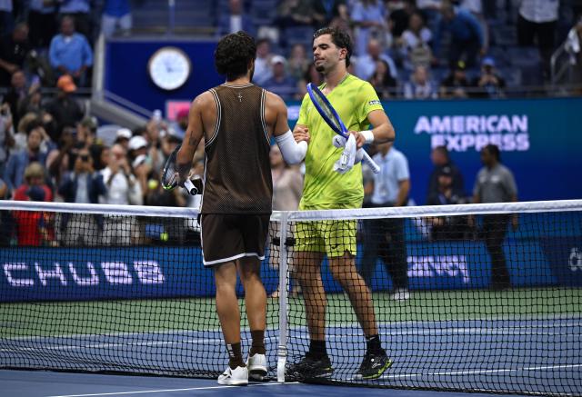 (260903) -- NEW YORK, Sept. 3, 2026 (Xinhua) -- Carlos Alcaraz (L) greets Jaime Faria during the men's singles second round match between Carlos Alcaraz of Spain and Jaime Faria of Portugal at the 2026 US Open tennis championships in New York, the United States, Sept. 2, 2026. (Xinhua/Li Rui)