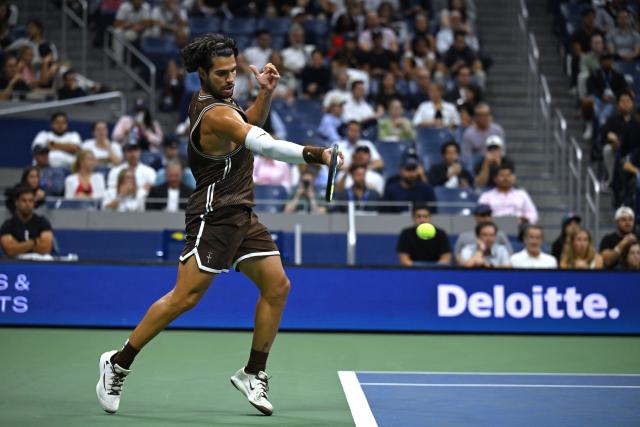 (260903) -- NEW YORK, Sept. 3, 2026 (Xinhua) -- Carlos Alcaraz reutrns a shot during the men's singles second round match between Carlos Alcaraz of Spain and Jaime Faria of Portugal at the 2026 US Open tennis championships in New York, the United States, Sept. 2, 2026. (Xinhua/Li Rui)