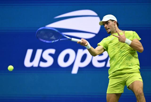 (260903) -- NEW YORK, Sept. 3, 2026 (Xinhua) -- Jaime Faria reutrns a shot during the men's singles second round match between Carlos Alcaraz of Spain and Jaime Faria of Portugal at the 2026 US Open tennis championships in New York, the United States, Sept. 2, 2026. (Xinhua/Li Rui)