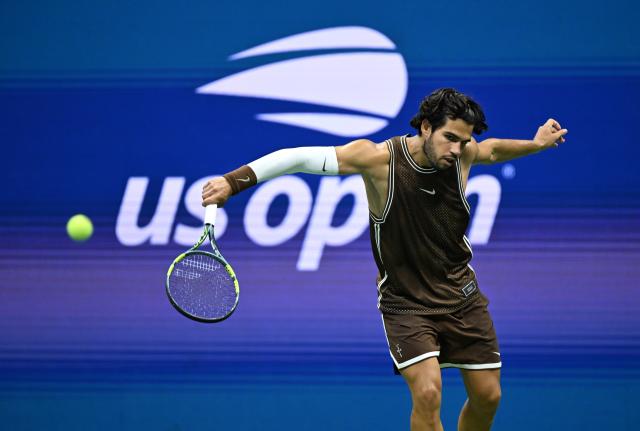 (260903) -- NEW YORK, Sept. 3, 2026 (Xinhua) -- Carlos Alcaraz reutrns a shot during the men's singles second round match between Carlos Alcaraz of Spain and Jaime Faria of Portugal at the 2026 US Open tennis championships in New York, the United States, Sept. 2, 2026. (Xinhua/Li Rui)