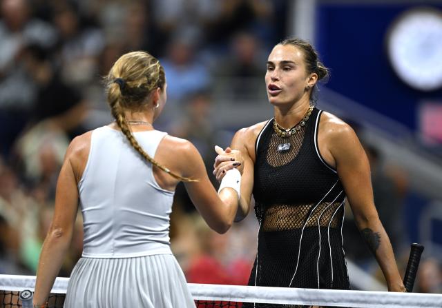 (260903) -- NEW YORK, Sept. 3, 2026 (Xinhua) -- Aryna Sabalenka (R) shakes hands with Polina Iatcenko after women's singles second round match betweetn Aryna Sabalenka of Belarus and Polina Iatcenko of Russia at the 2026 US Open tennis championships in New York, the United States, Sept. 2, 2026. (Xinhua/Li Rui)