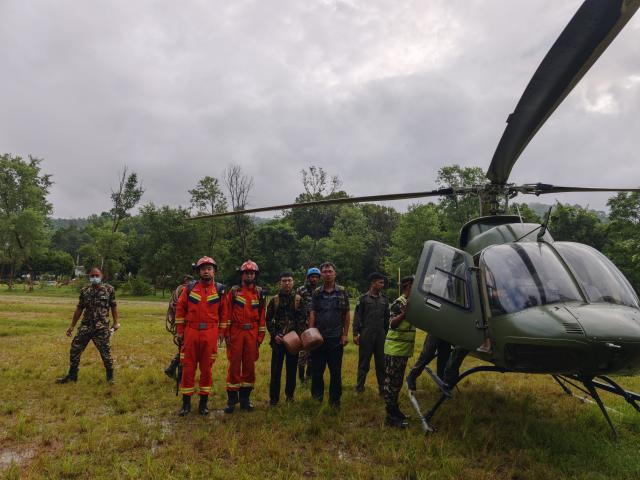 (260903) -- KATHMANDU, Sept. 3, 2026 (Xinhua) -- Chinese tunnel rescue experts arrive in Kathmandu, before heading to the mudslide-hit area via a helicopter in Nepal, Aug. 30, 2026.
  TO GO WITH "Feature: Braving chest-deep mud, Chinese rescue team races to find survivors in mudslide-hit Nepal" (Chinese Embassy in Nepal/Handout via Xinhua)