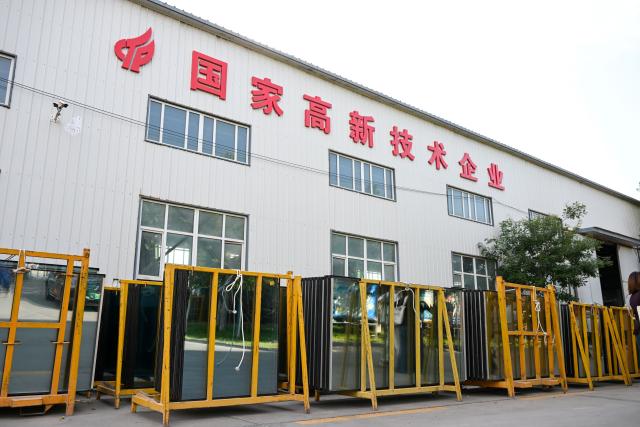 (260903) -- URUMQI, Sept. 3, 2026 (Xinhua) -- This photo taken on Sept. 2, 2026 shows a special glass company in Yining City, northwest China's Xinjiang Uygur Autonomous Region.
  By leveraging its rich resources, Xinjiang has made remarkable progress in developing the new materials sector and forging new growth engines in recent years. Years of sustained effort to achieve breakthroughs in core technologies in key fields and in smart manufacturing of new materials have boosted industrial cluster formation and drive high-quality growth in the region. (Xinhua/Ding Lei)