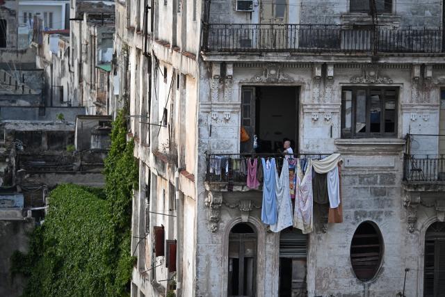 (260903) -- HAVANA, Sept. 3, 2026 (Xinhua) -- An elderly man is pictured at the balcony of a building in Havana, capital of Cuba, Aug. 30, 2026. (Xinhua/Li Muzi)