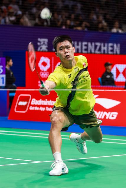 (260903) -- SHENZHEN, Sept. 3, 2026 (Xinhua) -- Brian Yang hits a return during the men's singles round of 16 match between Brian Yang of Canada and Naraoka Kodai of Japan at China Masters 2026 badminton tournament in Shenzhen, south China's Guangdong Province, Sept. 3, 2026. (Photo by Peng Zhigang/Xinhua)
