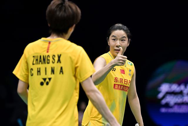(260903) -- SHENZHEN, Sept. 3, 2026 (Xinhua) -- Jia Yifan (R)/Zhang Shuxian react during the women's doubles round of 16 match between Jia Yifan/Zhang Shuxian of China and Low Zi Yu/Noraqilah Maisarah of Malaysia at China Masters 2026 badminton tournament in Shenzhen, south China's Guangdong Province, Sept. 3, 2026. (Photo by Chu Yan/Xinhua)