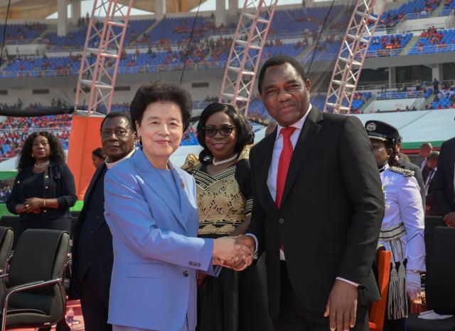 (260903) -- LUSAKA, Sept. 3, 2026 (Xinhua) -- Zambian President Hakainde Hichilema (R, front) shakes hands with Chinese President Xi Jinping's Special Envoy Xian Hui, also the vice chairperson of the National Committee of the Chinese People's Political Consultative Conference, at the inauguration ceremony in Lusaka, Zambia, Sept. 1, 2026. Xian Hui attended the inauguration of President Hakainde Hichilema here on Tuesday, at the invitation of the Zambian government. (Xinhua/Yang Guang)