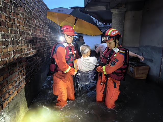 (260903) -- FUZHOU, Sept. 3, 2026 (Xinhua) -- Rescuers evacuate an elderly man stranded in flood water in Xianyou County of Putian City, southeast China's Fujian Province, Sept. 1, 2026. Typhoon Saudel, the 18th typhoon of 2026, made its third landfall in Fujian Province on Thursday, with maximum sustained winds of 23 meters per second near its center, according to the provincial meteorological observatory.
   Local authorities have quickly carried out rescue and flood drainage operations as persistent heavy rain battered parts of the province. (Xinhua)