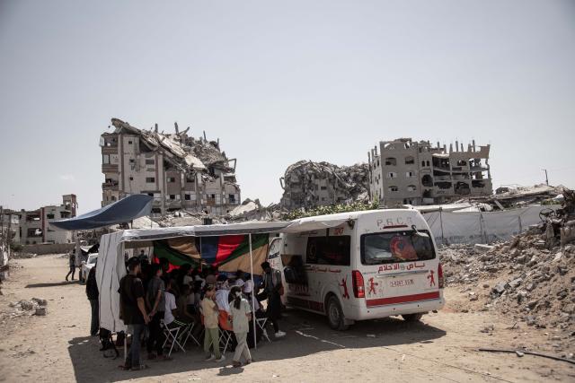 (260903) -- GAZA, Sept. 3, 2026 (Xinhua) -- A Red Crescent ambulance converted into mobile entertainment and psychological support unit, dubbed the "dream bus", is seen in the Tel al-Hawa neighborhood in Gaza City, on Sept. 2, 2026. The Dream Bus is an innovative initiative created by the Palestinian Red Crescent Association, aiming to alleviate the psychological and social pressures faced by children. (Photo by Abdul Rahman Salama/Xinhua)