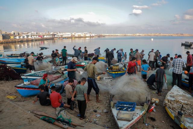 (260903) -- GAZA, Sept. 3, 2026 (Xinhua) -- Palestinian fishermen are seen working at Gaza's seaport, in Gaza City, on Sept. 3, 2026. (Photo by Rizek Abdeljawad/Xinhua)