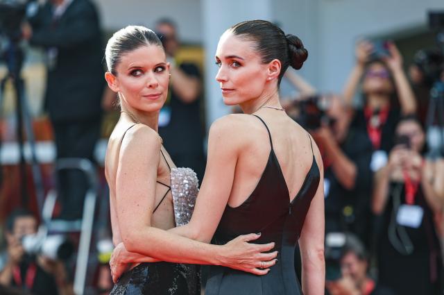 (260903) -- VENICE, Sept. 3, 2026 (Xinhua) -- American actress Kate Mara (L) and American actress Rooney Mara pose at the red carpet before the premiere of the film "Bucking Fastard" during the 83rd Venice International Film Festival in Venice, Italy, Sept. 3, 2026. (Xinhua/Wang Kaiyan)