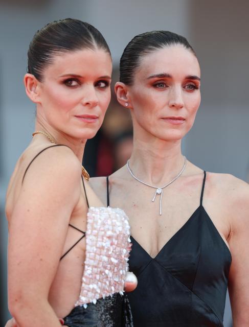(260903) -- VENICE, Sept. 3, 2026 (Xinhua) -- American actress Kate Mara (L) and American actress Rooney Mara pose at the red carpet before the premiere of the film "Bucking Fastard" during the 83rd Venice International Film Festival in Venice, Italy, Sept. 3, 2026. (Xinhua/Wang Kaiyan)