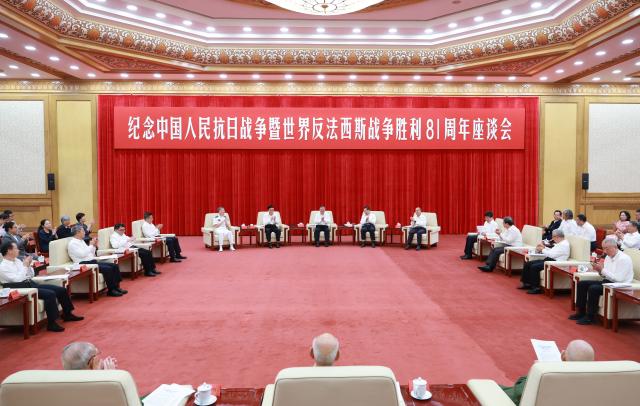 (260904) -- BEIJING, Sept. 4, 2026 (Xinhua) -- Li Shulei, a member of the Political Bureau of the Communist Party of China (CPC) Central Committee and head of the Publicity Department of the CPC Central Committee, attends a symposium to commemorate the 81st anniversary of the victory in the Chinese People's War of Resistance Against Japanese Aggression and the World Anti-Fascist War, in Beijing, capital of China, Sept. 3, 2026. (Xinhua/Wang Ye)