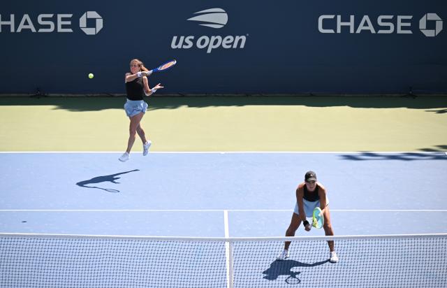 (260904) -- NEW YORK, Sept. 4, 2026 (Xinhua) -- Ulrikke Eikeri (L)/Quinn Gleason compete during the women's doubles first round match betweetn Wang Xinyu (China)/Uchijima Moyuka(Japan) and Ulrikke Eikeri(Norway)/Quinn Gleason(the United States) at the 2026 US Open tennis championships in New York, the United States, Sept. 3, 2026. (Xinhua/Li Rui)
