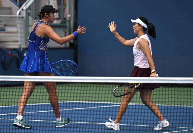 (260904) -- NEW YORK, Sept. 4, 2026 (Xinhua) -- Wang Xiyu (L)/Xu Yifan of China celebrate scoring during the women's doubles first round match between Wang Xiyu/Xu Yifan of China and Claire Liu/Julieta Pareja of the United States at the 2026 US Open tennis championships in New York, the United States, Sept. 3, 2026. (Xinhua/Li Rui)