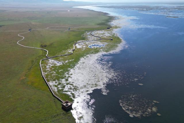 (260904) -- GANNAN, Sept. 4, 2026 (Xinhua) -- An aerial drone photo taken on Sept. 3, 2026 shows the scenery of Gahai Lake in Luqu County of Gannan Tibetan Autonomous Prefecture, northwest China's Gansu Province. (Xinhua/Zhang Zhimin)