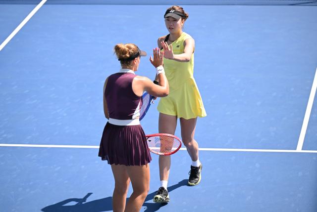 (260904) -- NEW YORK, Sept. 4, 2026 (Xinhua) -- Tang Qianhui (R)/Elena Pridankina celebrate scoring during the women's doubles first round match between Tang Qianhui (China)/Elena Pridankina (Russia) and Katarzyna Piter (Poland)/Anna Siskova (the Czech Republic) at the 2026 US Open tennis championships in New York, the United States, Sept. 3, 2026. (Xinhua/Li Rui)
