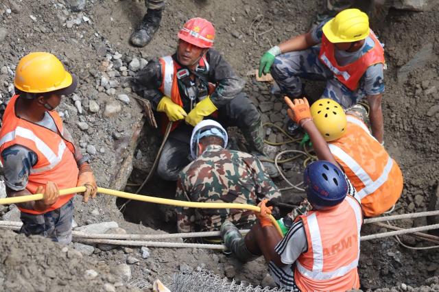 (260904) -- KATHMANDU, Sept. 4, 2026 (Xinhua) -- Rescuers carry out rescue operations in Rasuwa district, Nepal, Sept. 4, 2026. Two men trapped inside the tunnel of the Trishuli 3A hydropower project, which was badly affected by last week's deadly mudslide, were rescued alive on Friday, the Nepali Army said. (RSS via Xinhua)