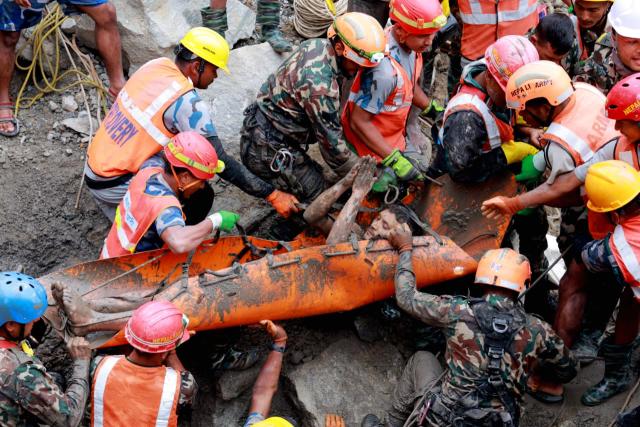 (260904) -- KATHMANDU, Sept. 4, 2026 (Xinhua) -- Rescuers transfer a worker rescued alive in Rasuwa district, Nepal, Sept. 4, 2026. Two men trapped inside the tunnel of the Trishuli 3A hydropower project, which was badly affected by last week's deadly mudslide, were rescued alive on Friday, the Nepali Army said. (Nepali Army/Handout via Xinhua)
