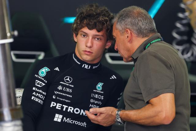 (260904) -- MONZA, Sept. 4, 2026 (Xinhua) -- Mercedes' driver Kimi Antonelli (L) of Italy listens to his father Marco Antonelli before the first practice session of the Formula 1 Italian Grand Prix at Monza Circuit, near Milan, Italy, on Sept. 4, 2026. (Photo by Qian Jun/Xinhua)