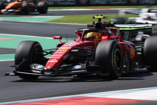 (260904) -- MONZA, Sept. 4, 2026 (Xinhua) -- Ferrari's Lewis Hamilton of Britain races during the first practice session of the Formula 1 Italian Grand Prix at Monza Circuit, near Milan, Italy, on Sept. 4, 2026. (Xinhua/Li Jing)