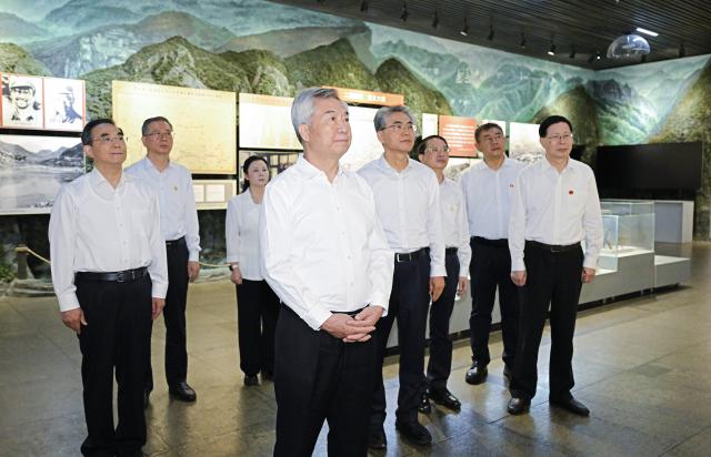 (260904) -- GUIYANG, Sept. 4, 2026 (Xinhua) -- Li Xi, a member of the Standing Committee of the Political Bureau of the Communist Party of China (CPC) Central Committee and secretary of the CPC Central Commission for Discipline Inspection, visits the site where the Zunyi Meeting was held in January 1935 during the Long March and an exhibition hall for the Zunyi Meeting, in Zunyi, southwest China's Guizhou Province, Sept. 2, 2026. Li made a research tour from Tuesday to Thursday in southwest China's Guizhou Province. (Xinhua/Yue Yuewei)