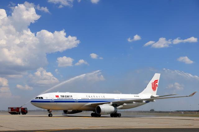 (260904) -- BUCHAREST, Sept. 4, 2026 (Xinhua) -- Air China's CA914 flight receives a water salute after arriving at Henri Coanda International Airport near Bucharest, Romania, Sept. 4, 2026. Air China launched its maiden Beijing-Bucharest-Zagreb flight on Friday, restoring direct passenger links between China and Romania after more than two decades and inaugurating the first-ever scheduled passenger service between China and Croatia. (Photo by Cristian Cristel/Xinhua)