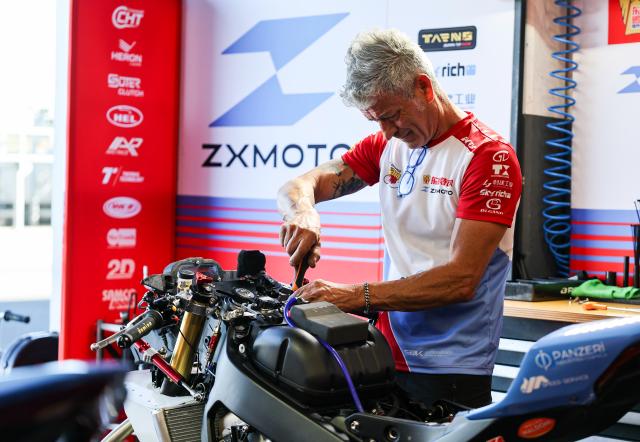 (260905) -- MAGNY-COURS, Sept. 5, 2026 (Xinhua) -- A technician of EASTROC ZXMOTO Evan Bros Factory works in the pitline after the Superpole of WorldSSP at the FIM Supersport World Championship French Round in Magny-Cours, France, Sept. 4, 2026. (Xinhua/Wu Huiwo)