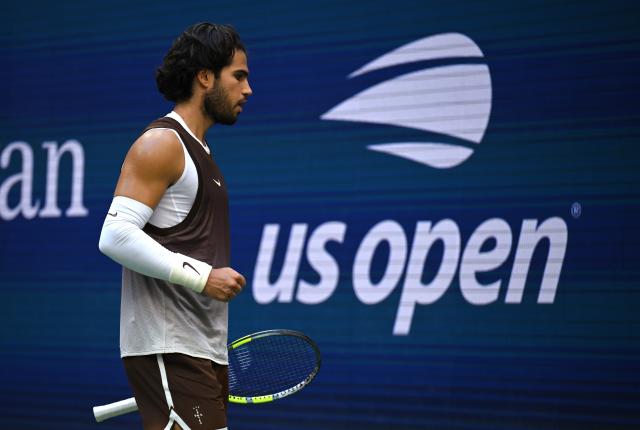 (260905) -- NEW YORK, Sept. 5, 2026 (Xinhua) -- Carlos Alcaraz of Spain reacts during the men's singles third round match against Wu Yibing of China at the 2026 US Open tennis championships in New York, the United States, Sept. 4, 2026. (Xinhua/Li Rui)