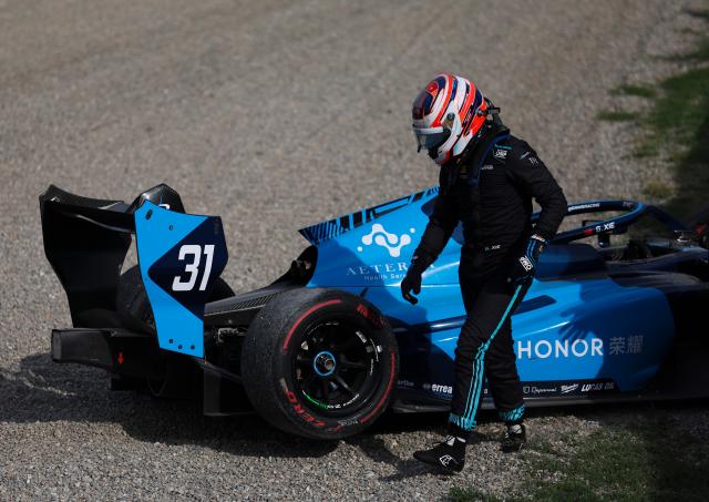 (260905) -- MONZA, Sept. 5, 2026 (Xinhua) -- Dams Lucas Oil driver Gerrard Xie of China leaves the circuit after crashing with Hitech driver Shin Woohyun of South Korea during the sprint race of the Formula 3 Italian Grand Prix at Monza Circuit, near Milan, Italy, on Sept. 5, 2026. (Xinhua/Li Jing)