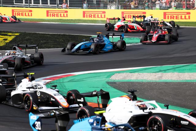 (260905) -- MONZA, Sept. 5, 2026 (Xinhua) -- Dams Lucas Oil driver Gerrard Xie (C) of China races during the sprint race of the Formula 3 Italian Grand Prix at Monza Circuit, near Milan, Italy, on Sept. 5, 2026. (Xinhua/Li Jing)
