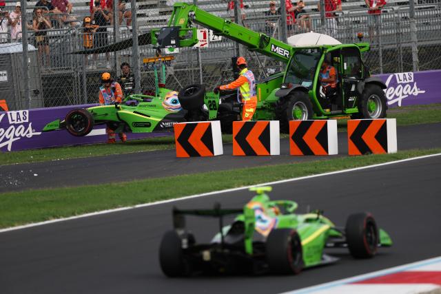 (260905) -- MONZA, Sept. 5, 2026 (Xinhua) -- AIX Racing driver of Brazil Fernando Barrichello watches his car being towed off the circuit after crashing during the sprint race of the Formula 3 Italian Grand Prix at Monza Circuit, near Milan, Italy, on Sept. 5, 2026. (Xinhua/Li Jing)