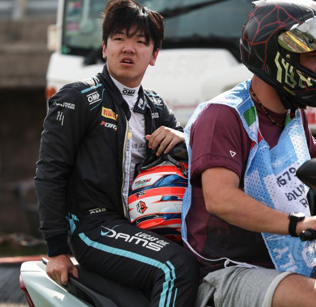 (260905) -- MONZA, Sept. 5, 2026 (Xinhua) -- Dams Lucas Oil driver Gerrard Xie of China reacts after crashing with Hitech driver Shin Woohyun of South Korea during the sprint race of the Formula 3 Italian Grand Prix at Monza Circuit, near Milan, Italy, on Sept. 5, 2026. (Xinhua/Li Jing)